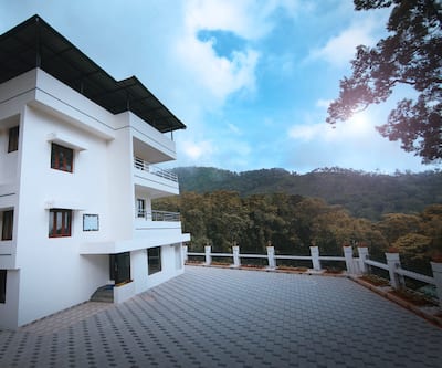 https://imgcld.yatra.com/ytimages/image/upload/t_hotel_yatra_city_desktop/v1479201259/Domestic Hotels/Hotels_Munnar/Excellency Forest Trail/Exterior.jpg